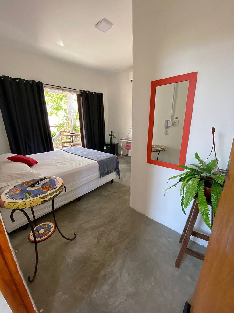 Suíte 1 com varanda - Casa Praiana