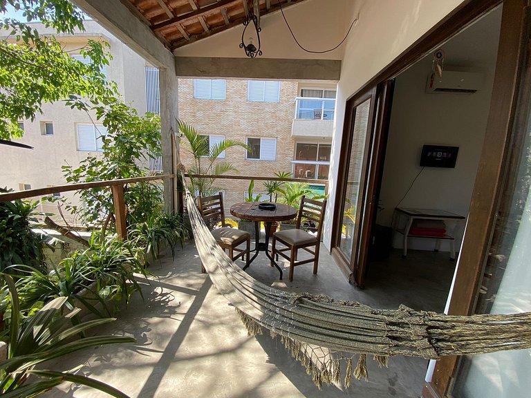Suíte 1 com varanda - Casa Praiana